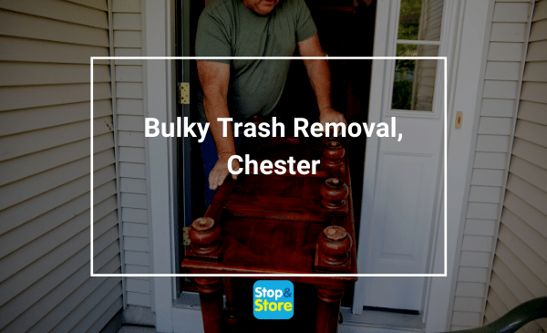 Man moving out bulky furniture for replacement or disposal, or recycling